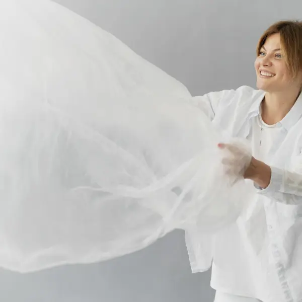 medium shot smiley woman with textile